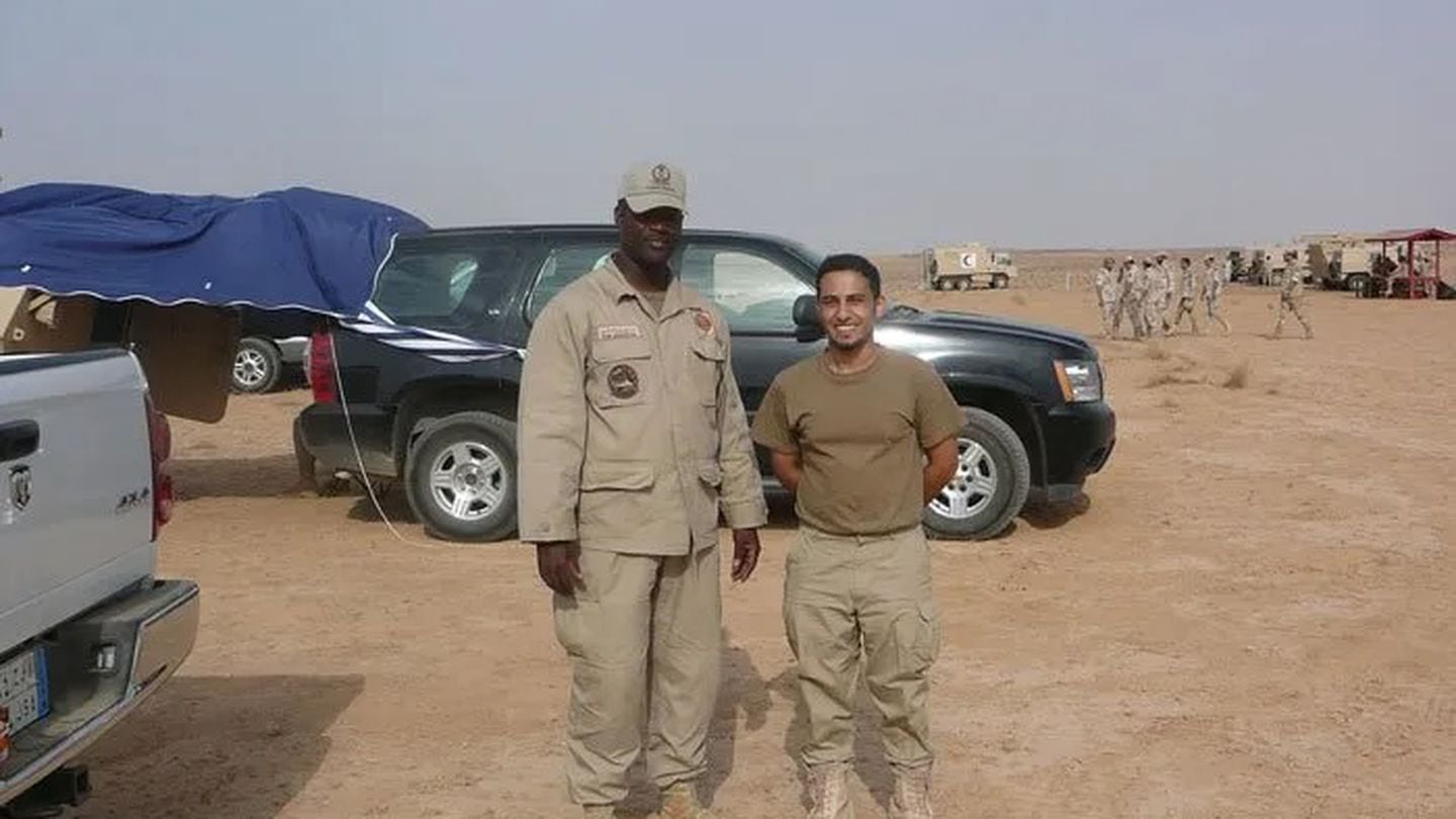 Ernest Barrington (left), pictured with interpreter, Abdulah Al Harbi, during Barrington’s time as a contract worker in Saudi Arabia, training with the Saudi Arabian National Guard in 2009. (Photo courtesy of Ernest Barrington)
