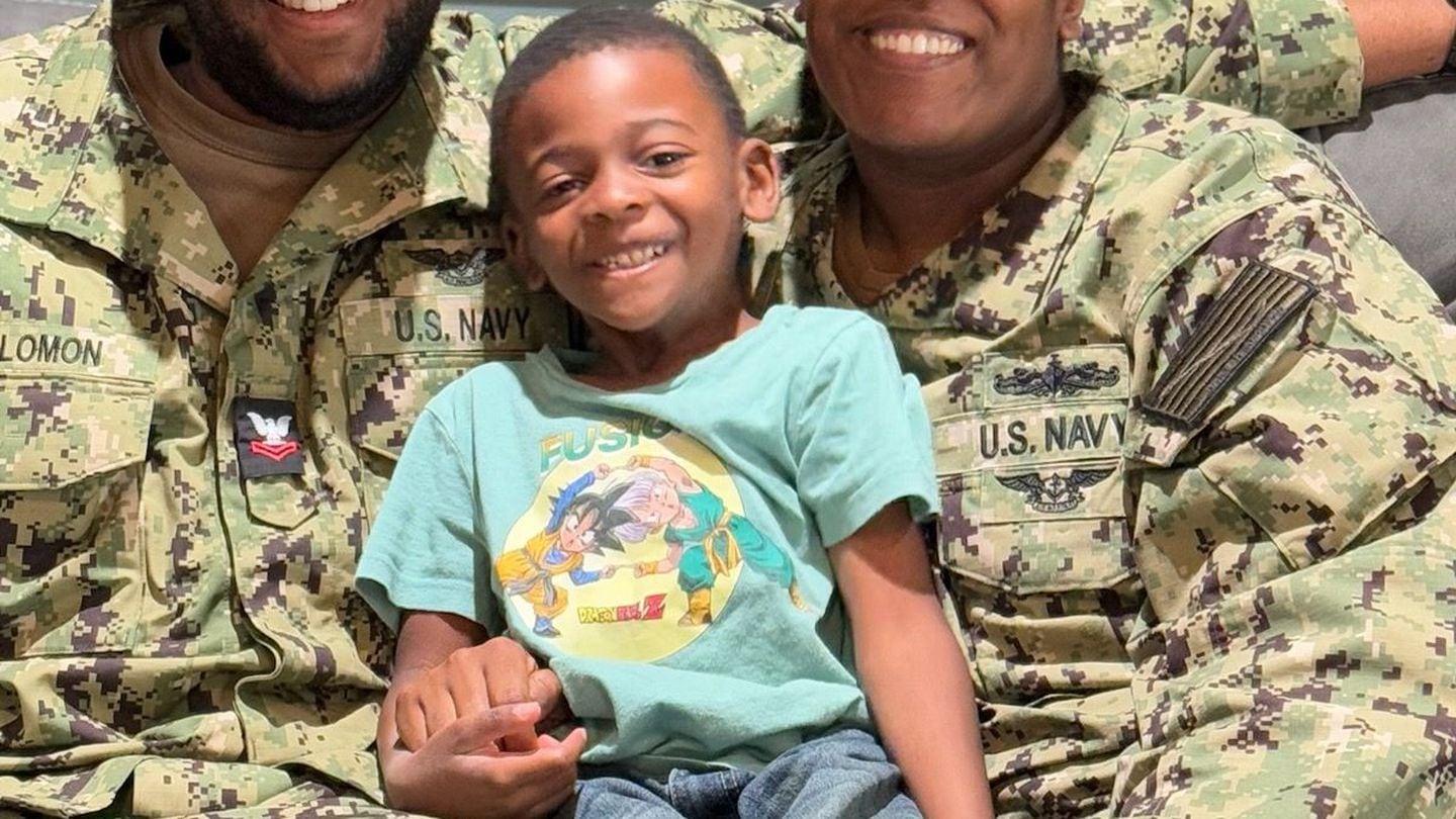 The 24-hour center at Joint Expeditionary Base Little Creek-Fort Story, Va., helps military families like the Solomons, who have nontraditional work schedules. Shown here, Gunner's Mate 2nd Class Niko Solomon, Master-at-Arms 1st Class Imani Solomon and their son Isaiah, 5. (Courtesy of the Solomon family)